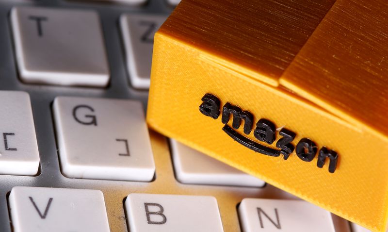 FILE PHOTO: A 3D printed Amazon postal package is placed on a keyboard in this illustration taken