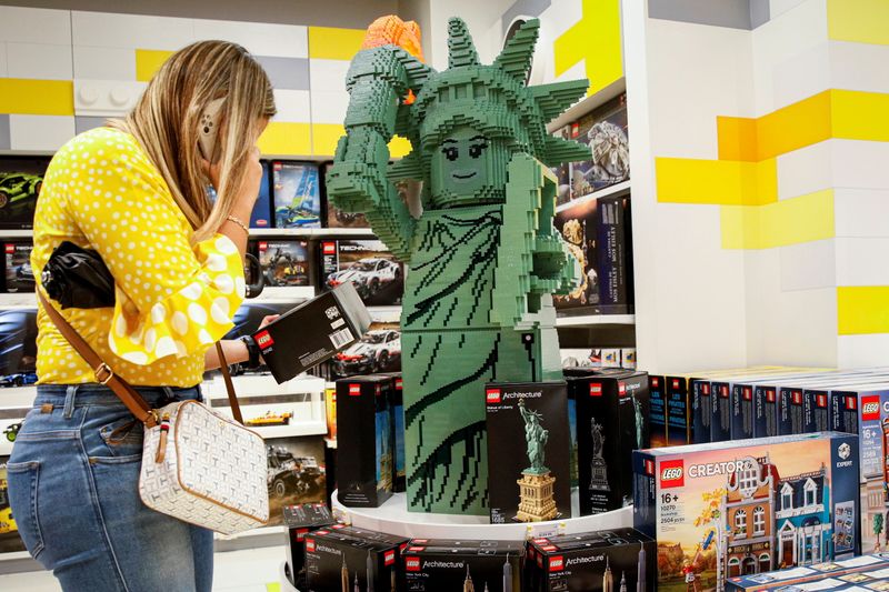 A customer shops in the 5th Avenue Lego store in New York