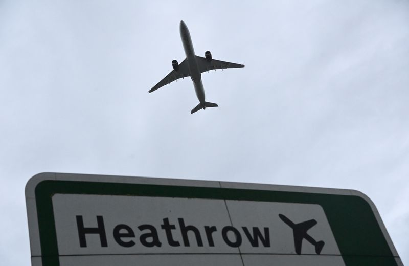 FILE PHOTO: Aircraft takes off at Heathrow Airport amid COVID-19 pandemic in London