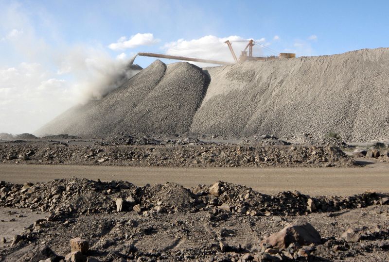 FILE PHOTO: Mining machine is seen at the Bayan Obo mine containing rare earth minerals, in Inner Mongolia