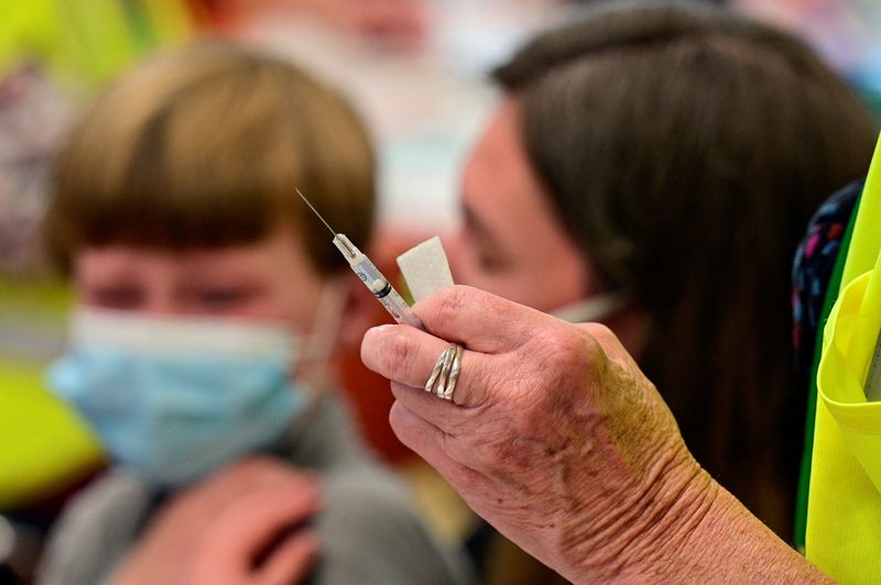 FILE PHOTO: Children age 5 to 11 receive COVID-19 vaccines in Louisville