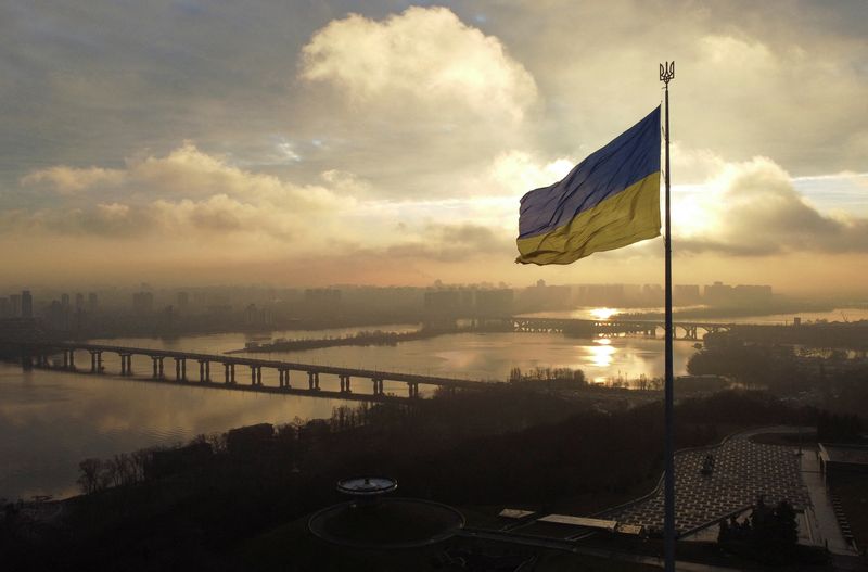 Ukraine's biggest national flag on the country's highest flagpole is seen at a compound of the World War II museum in Kyiv