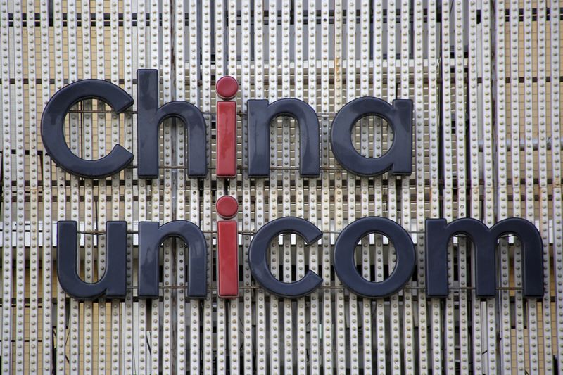 China Unicom's company logo is seen at its branch office in Beijing