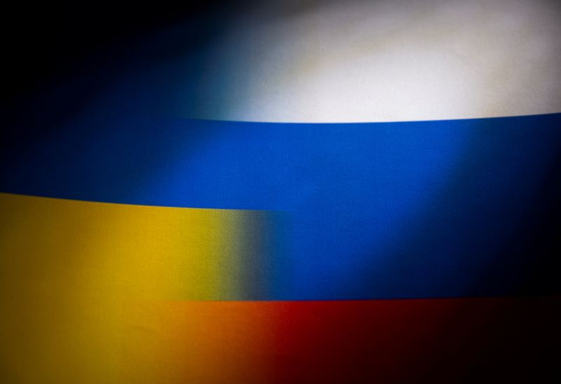 FILE PHOTO: Illustration shows Russia's and Ukraine's flags