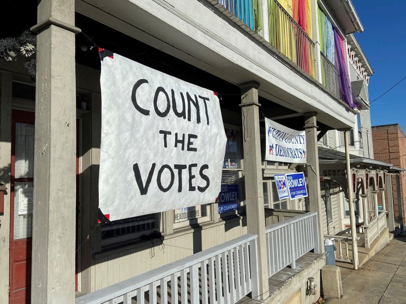 FILE PHOTO: A sign urging people to vote is seen on the porch of the Democratic Party's Fulton County headquarters on Election Day in McConnellsburg, Pennsylvania