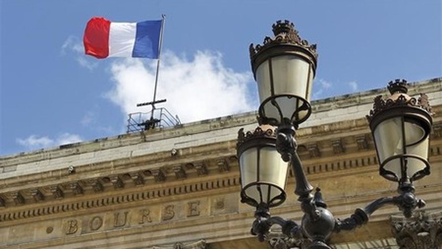 Bourse de Paris : 
                Paris reste dans le rouge à la mi-journée