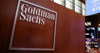 Goldman profit hit by weaker trading, rising expenses; shares tumble