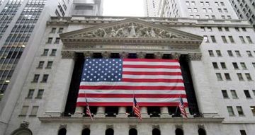 Wall Street clôture en hausse et veut croire à un semblant d'élan