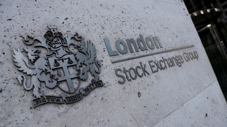 Londoner Aktien begrenzen Verluste, da die Bank of England Anleihen kauft
