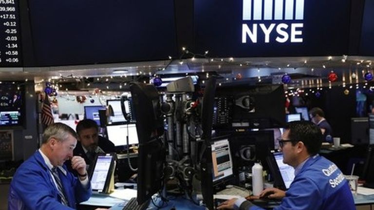 Wall Street Stock Exchange : 
                U.S. stocks end slightly higher as Tesla rallies