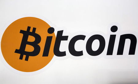 uA Bitcoin logo is displayed at the Bitcoin Center New York City in New York's financial district 