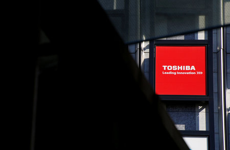 FILE PHOTO -  Logo of Toshiba Corp is seen outside an electronics retail store in Tokyo