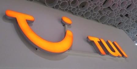 The logo of of German travel company TUI AG is seen outside of one of its branch offices in Vienna