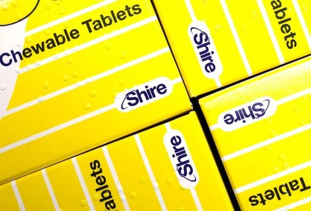 FILE PHOTO: Vitamins made by Shire are displayed at a chemist's in northwest London