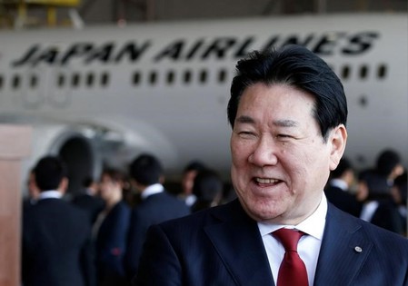 JAL Co's President Ueki speaks to the media after JAL group's initiation ceremony at a hangar of Haneda airport in Tokyo