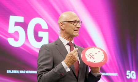 FILE PHOTO:Hoettges, CEO of Germany's Deutsche Telekom AG, attends the company's annual shareholder meeting in Cologne