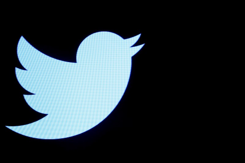 FILE PHOTO: File photo of the Twitter logo displayed on a screen on the floor of the NYSE