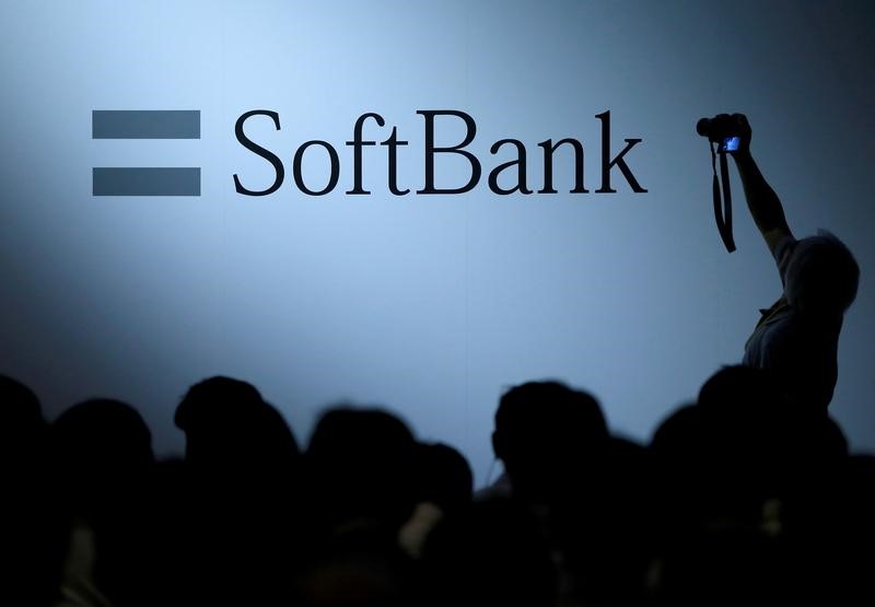 FILE PHOTO: The logo of SoftBank Group Corp is displayed at SoftBank World 2017 conference in Tokyo
