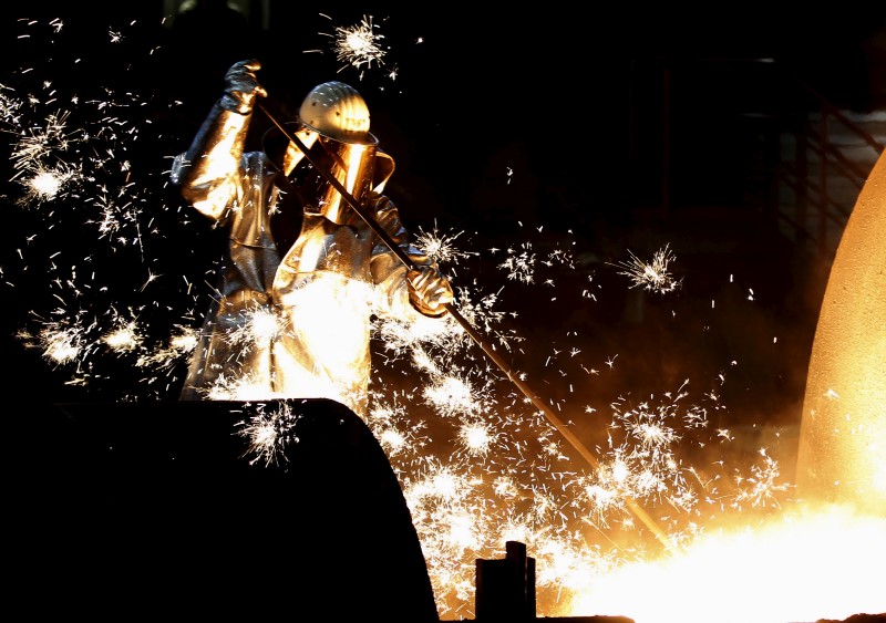 FILE PHOTO: A German steelmaker ThyssenKrupp worker controls a blast furnace in Duisburg