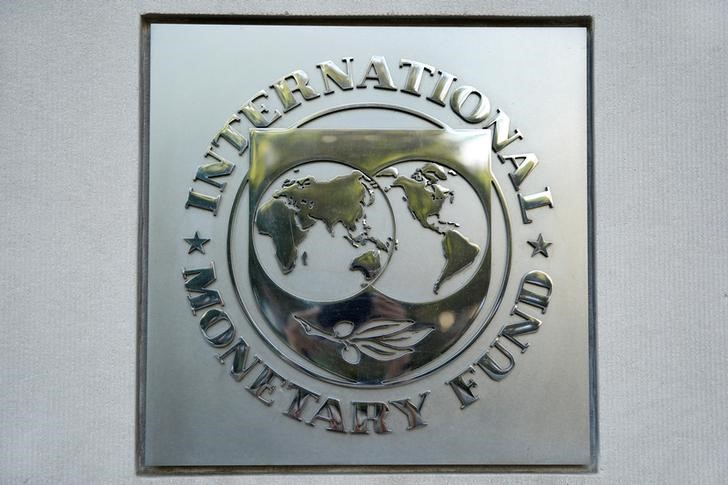 FILE PHOTO: The International Monetary Fund logo is seen at IMF headquarters in Washington