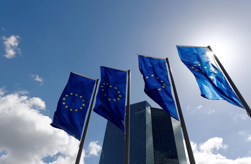 FILE PHOTO: European Union flags flutter outside the European Central Bank (ECB) headquarters in Frankfurt