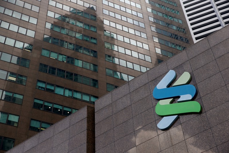 FILE PHOTO: A Standard Chartered bank branch in Singapore