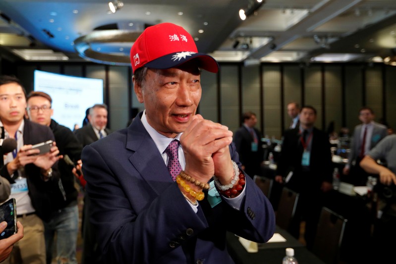 Terry Gou, founder and chairman of Foxconn, greets during an event that marks the 40th anniversary of the Taiwan Relations Act, in Taipei