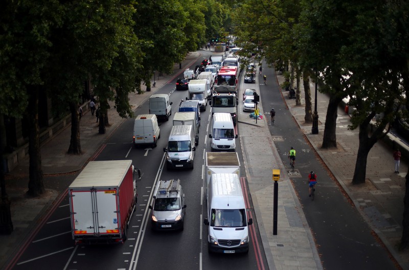 Cars sit in a traffic jam along the Embankment during the morning rush hour in central London