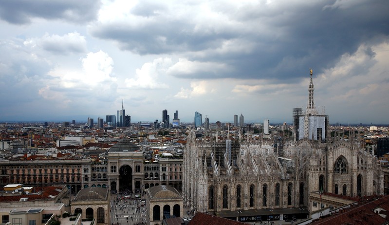 FILE PHOTO: Duomo's cathedral and Porta Nuova's financial district are seen in Milan