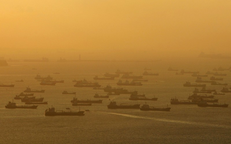 File photo of shipping vessels and oil tankers lining up on the eastern coast of Singapore