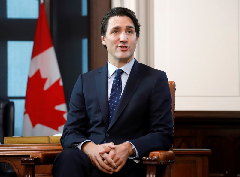 Canada's Prime Minister Trudeau speaks at a meeting with Leader of the Official Opposition Scheer in Ottawa
