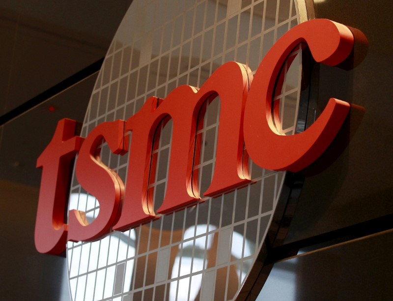 FILE PHOTO: The logo of Taiwan Semiconductor Manufacturing Co Ltd (TSMC) is seen at its headquarters in Hsinchu