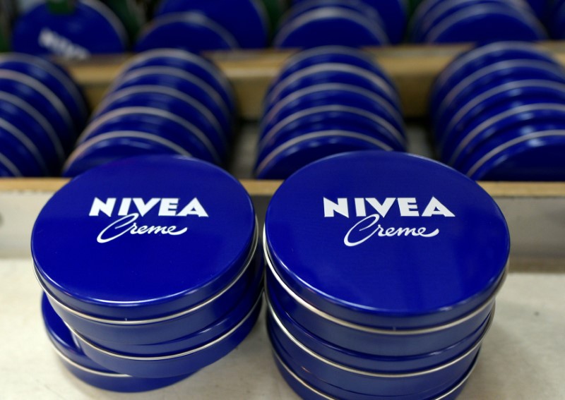 Nivea tins are seen in a production line at the plant of German personal-care company Beiersdorf in Hamburg