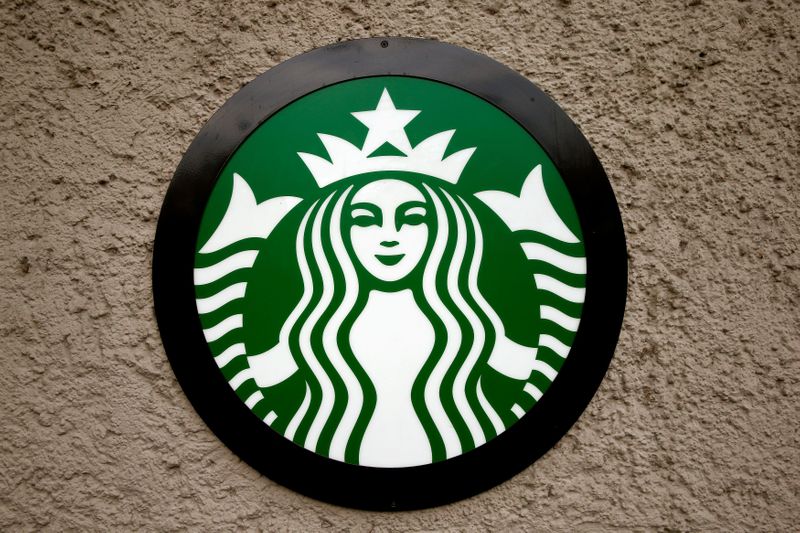 FILE PHOTO: Company's logo is seen at a Starbucks coffee shop in Zurich