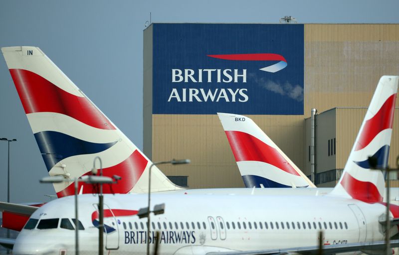 FILE PHOTO: British Airways aircraft are seen at Heathrow Airport in west London