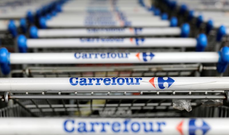 The logo of France-based food retailer Carrefour is seen on shopping trolleys in Sao Paulo