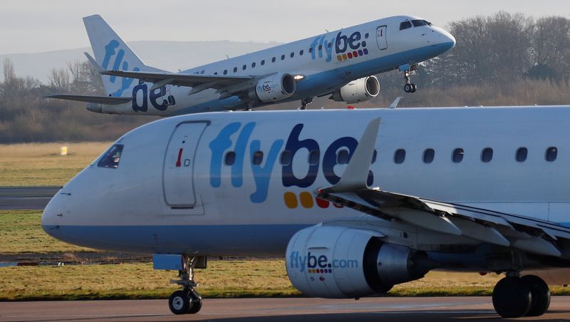 FILE PHOTO: A Flybe plane takes off from Manchester Airport in Manchester