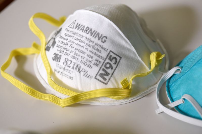 FILE PHOTO: Various N95 respiration masks at a laboratory of 3M, that has been contracted by the U.S. government to produce extra marks in response to the country's novel coronavirus outbreak, in Maplewood, Minnesota