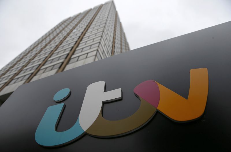 FILE PHOTO: A company sign is displayed outside an ITV studio in London