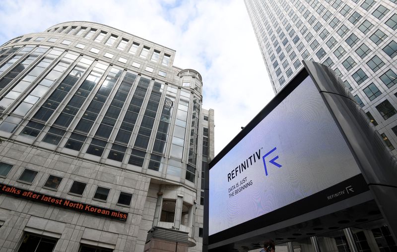 The Refinitiv logo is seen on a large screen in Canary Wharf in London