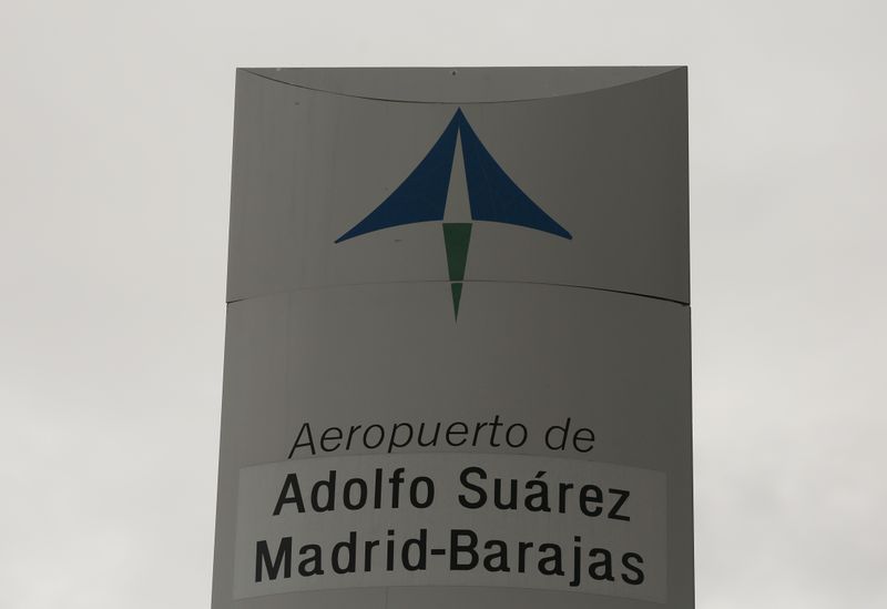 FILE PHOTO: The logo of Spanish airports operator Aena is seen on the top of a welcoming sign outside Adolfo Suarez Barajas airport in Madrid