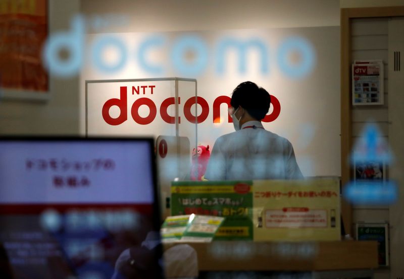 The logos of NTT Docomo are displayed at its shop in Tokyo, Japan