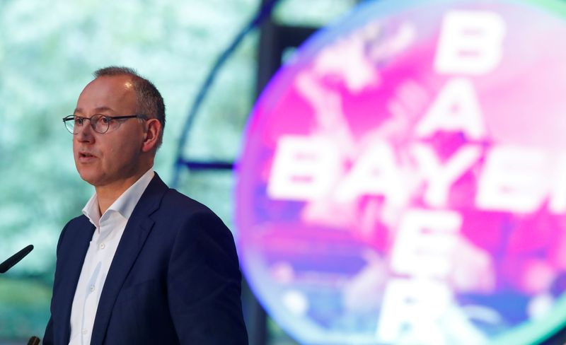 FILE PHOTO: Bayer CEO Werner Baumann addresses the company's annual results news conference