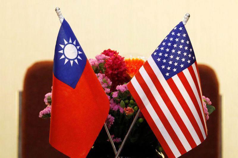 FILE PHOTO: Flags of Taiwan and U.S. are placed for a meeting in Taipei