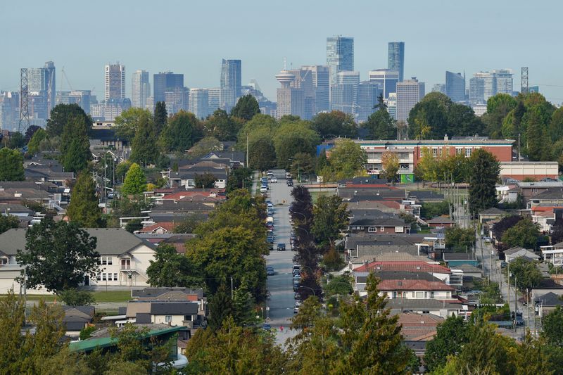 FILE PHOTO: Single family homes are seen against the Vancouver skyline, Canada