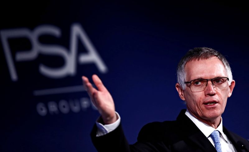 FILE PHOTO: Carlos Tavares, Chief Executive Officer and Chairman of the Managing Board of PSA Group, attends a news conference to announce the company's 2018 results at their headquarters in Rueil-Malmaison