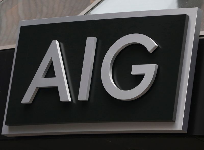 FILE PHOTO:  A new sign is displayed over the entrance to the AIG headquarters offices in New York's financial district