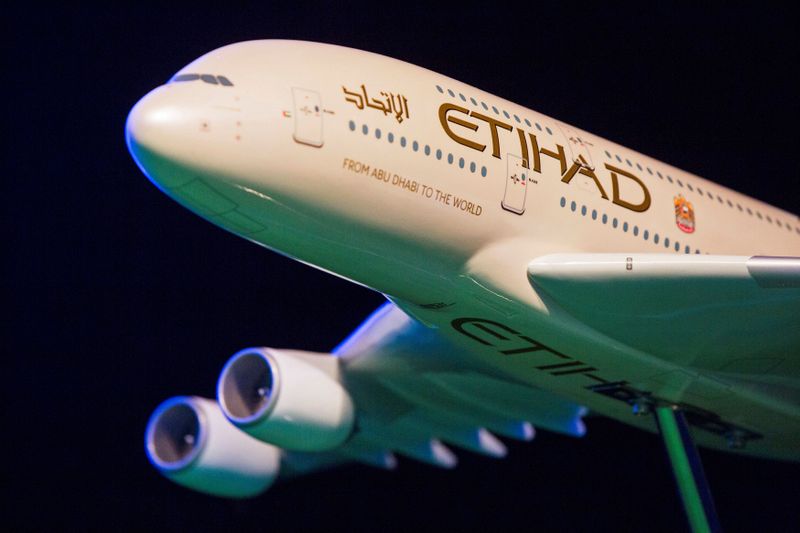 FILE PHOTO: A model Etihad Airways plane is seen in New York, U.S.