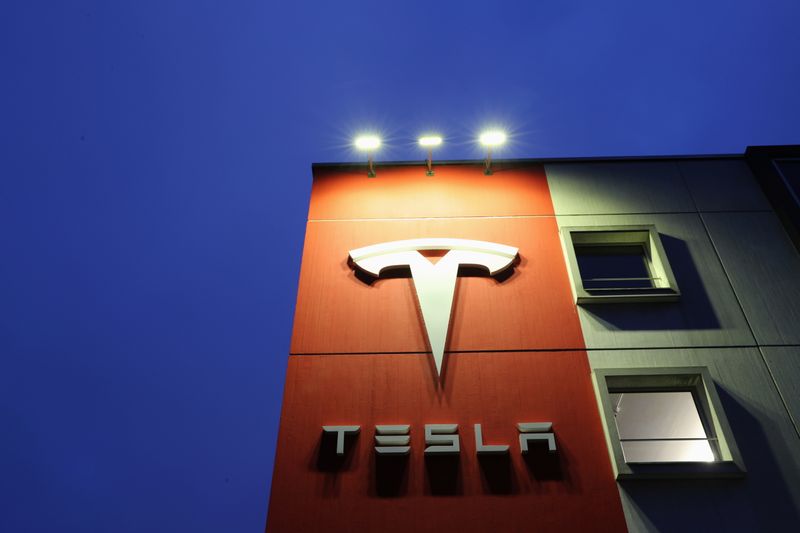 Logo of car manufacturer Tesla is seen at a branch office in Bern