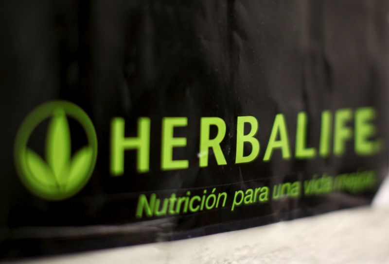 FILE PHOTO: An Herbalife logo is shown on a poster at a clinic in the Mission District in San Francisco